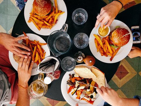 Aerial view of four people eating lunch